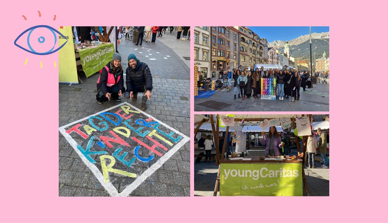 Menschen präsentieren sich beim Event mit bunten Plakaten und Informationen zu Kinderrechten.